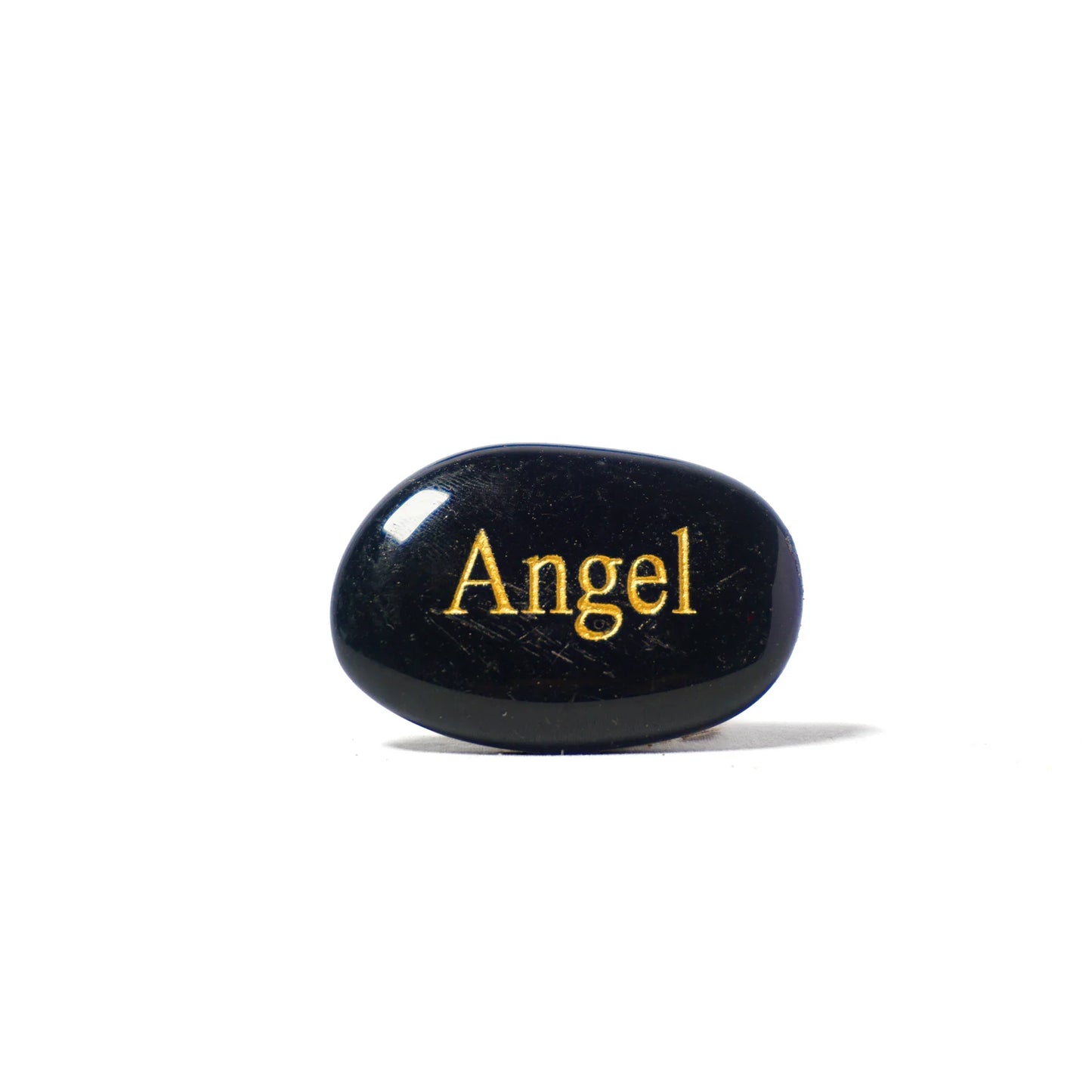 Black stone with 'Angel' engraved in gold on a white background