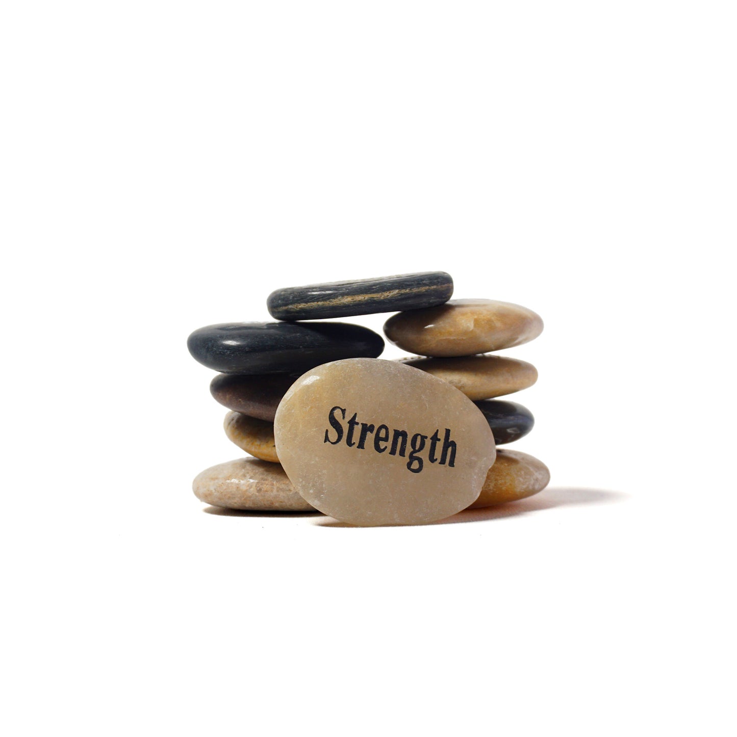 Stack of stones with one labeled 'Strength' on a white background