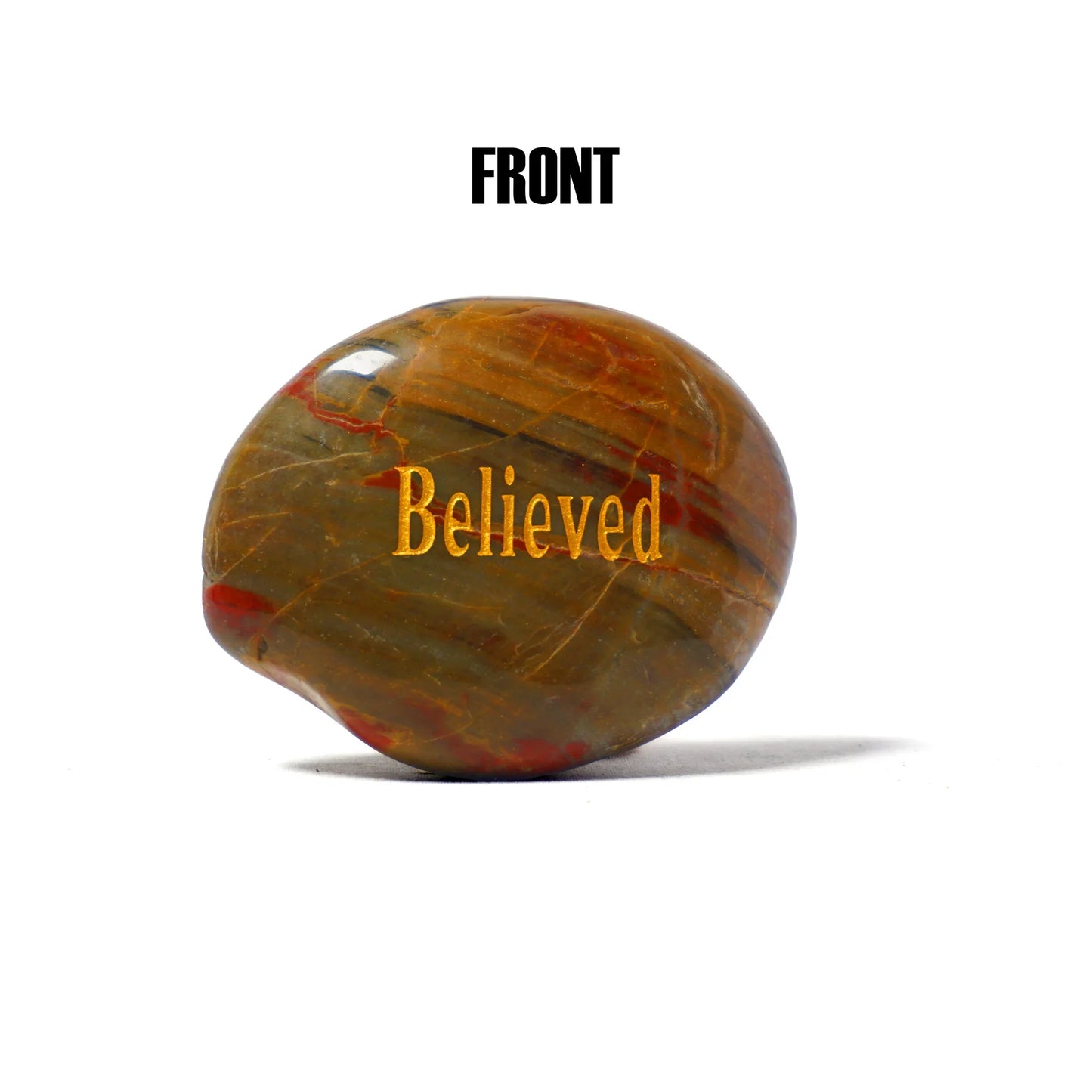 Marbled stone with 'Believed' text on a white background
