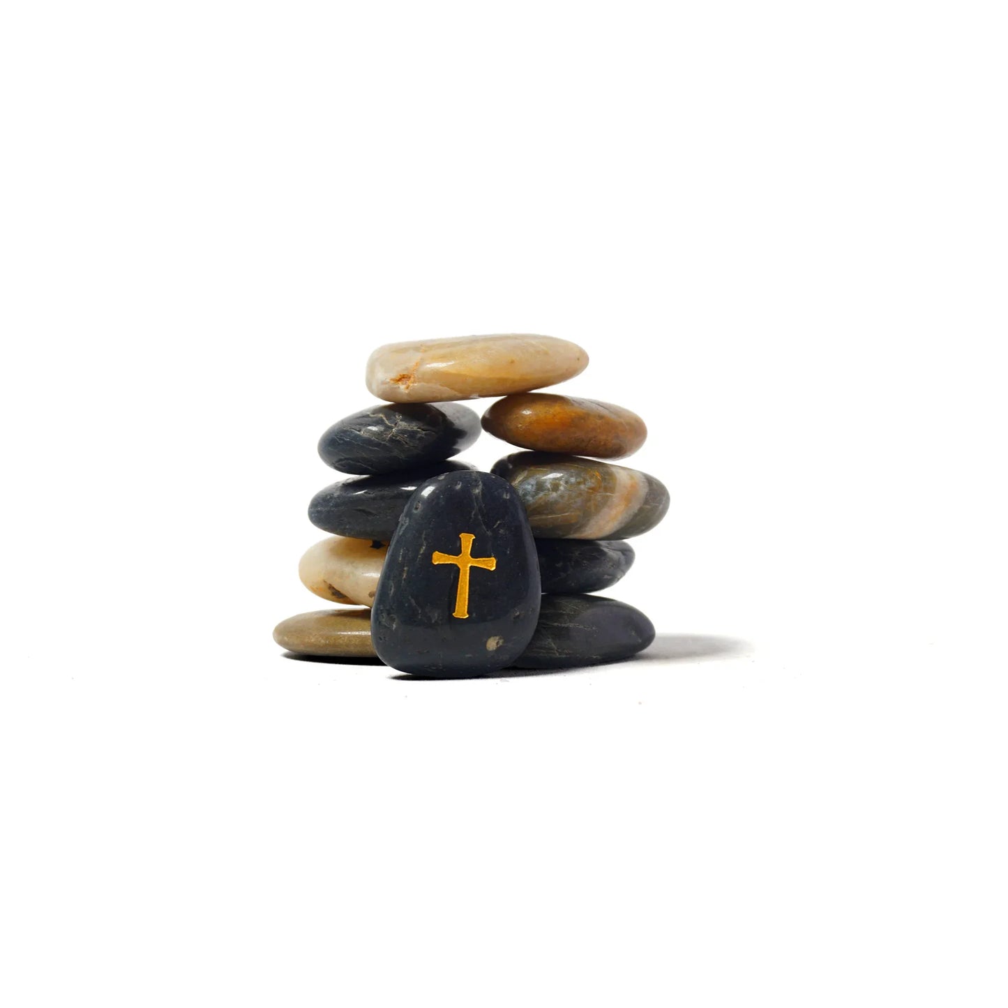 Stack of stones with a cross symbol on a white background