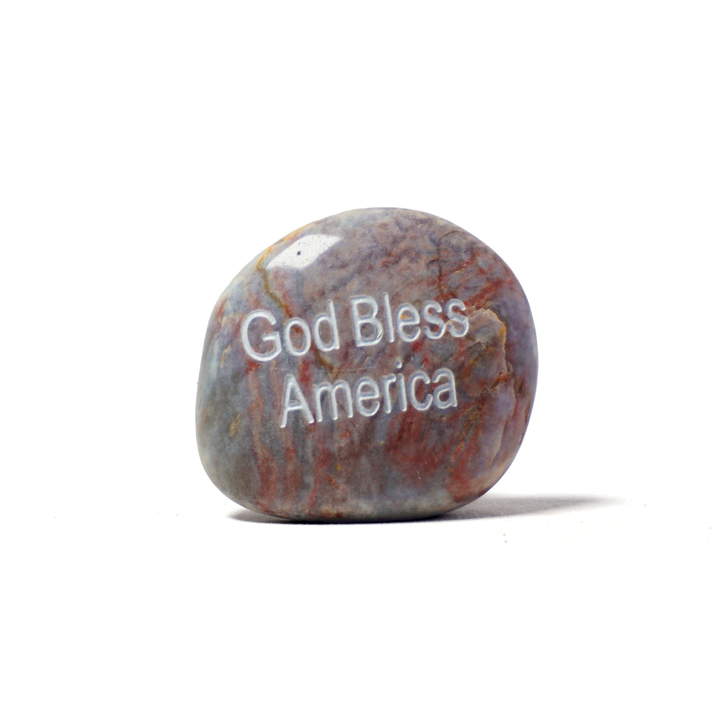 Decorative stone with 'God Bless America' engraving on a white background