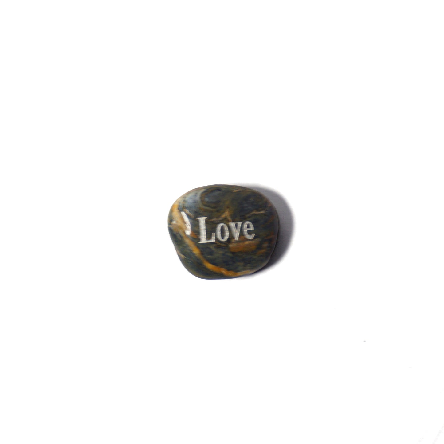 Decorative stone with 'I Love' engraving on a white background