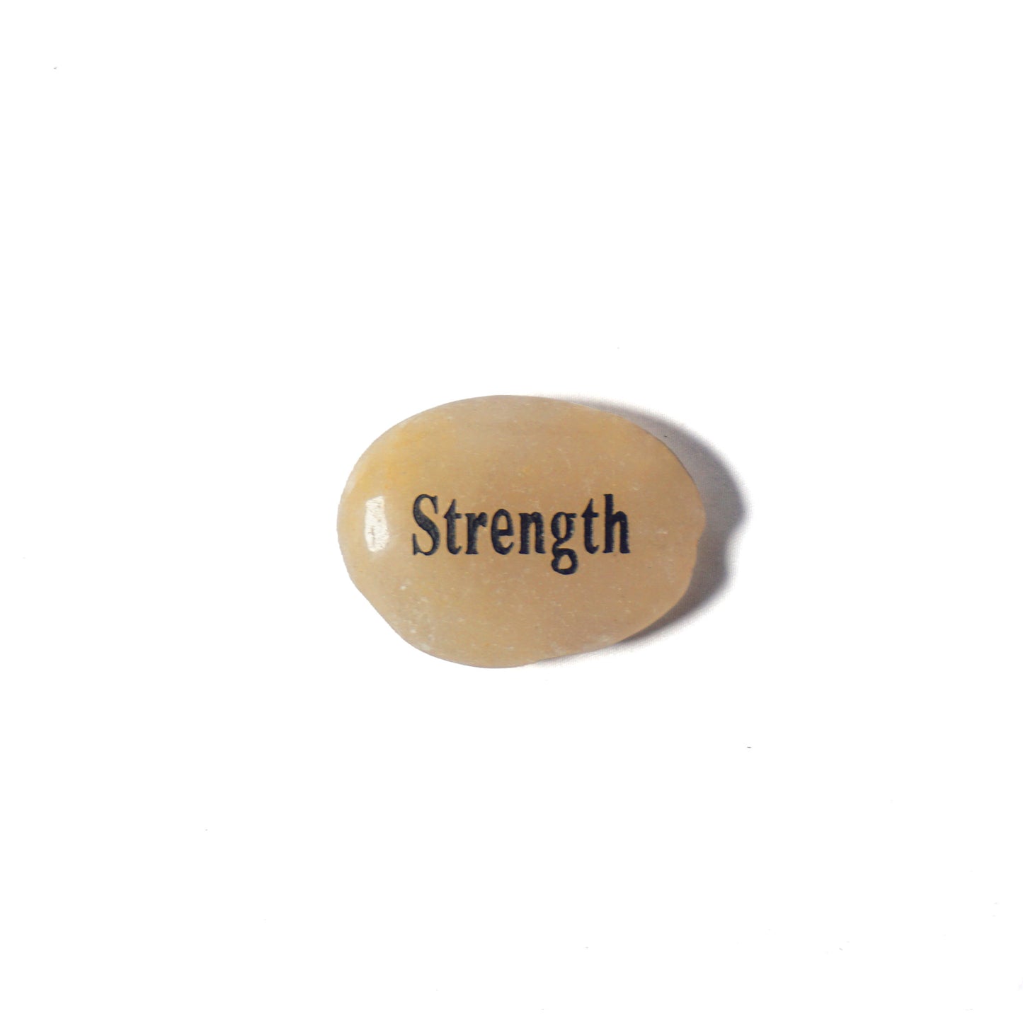 Beige stone with 'Strength' engraved on a white background
