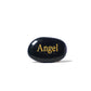Black stone with 'Angel' engraved in gold on a white background
