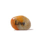 Decorative stone with 'Live' engraved on a white background