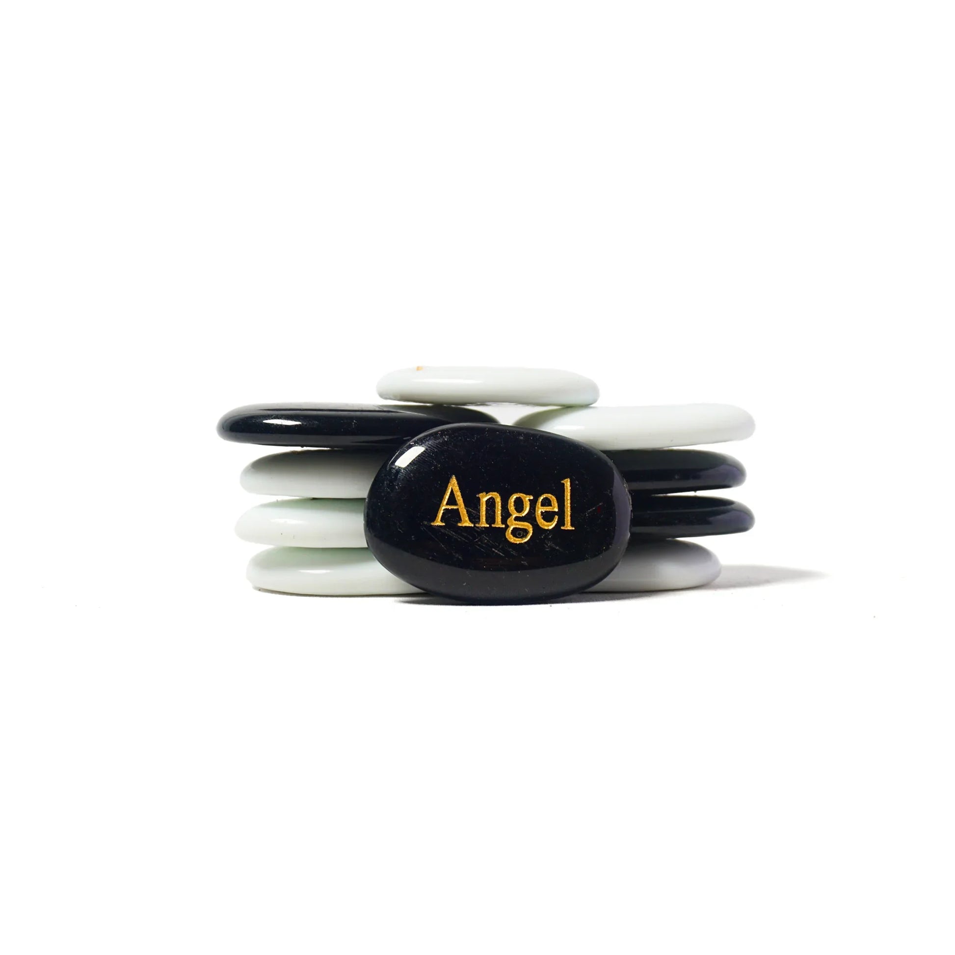 Stack of black and white stones with 'Angel' engraved on a white background