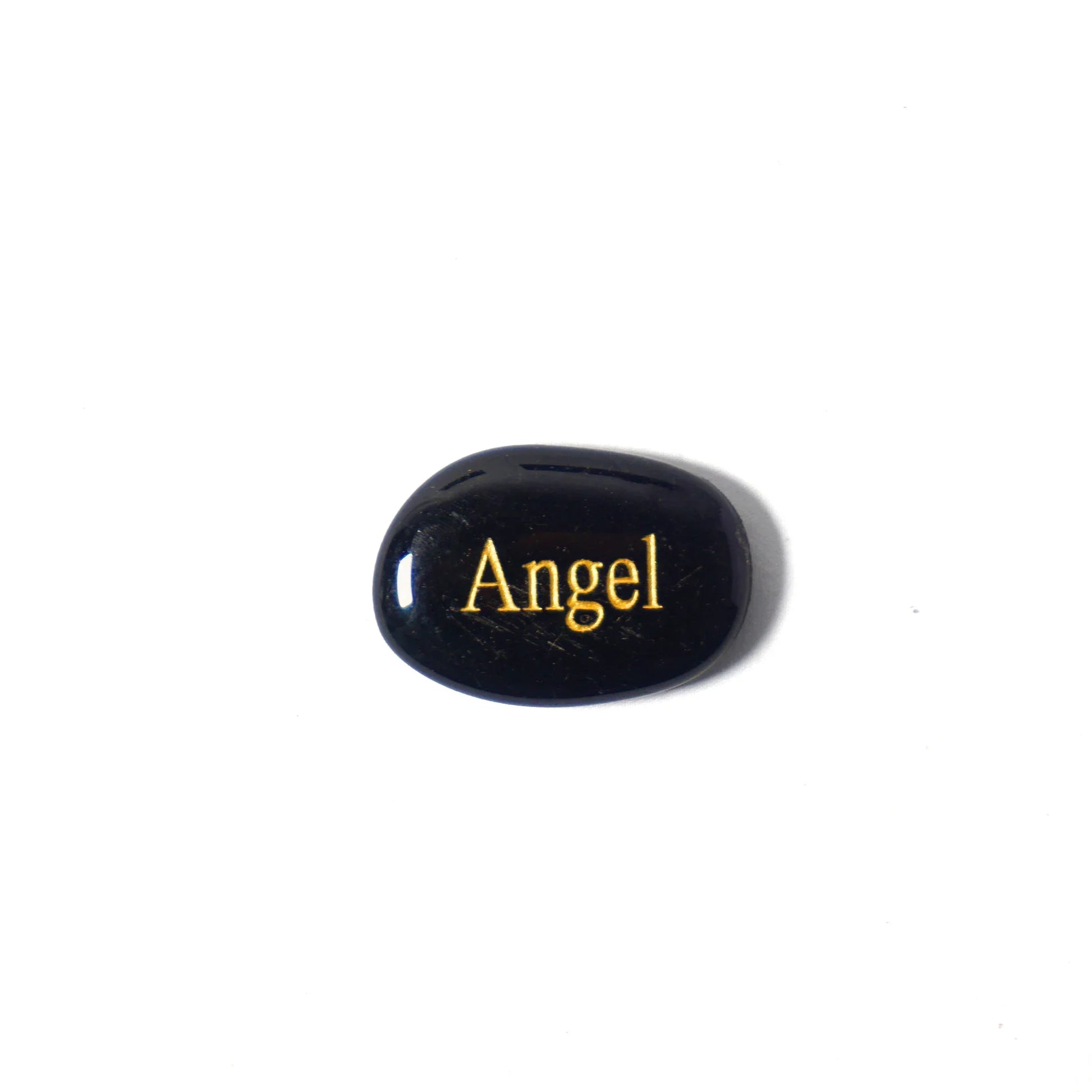 Black stone with 'Angel' engraved in gold on a white background