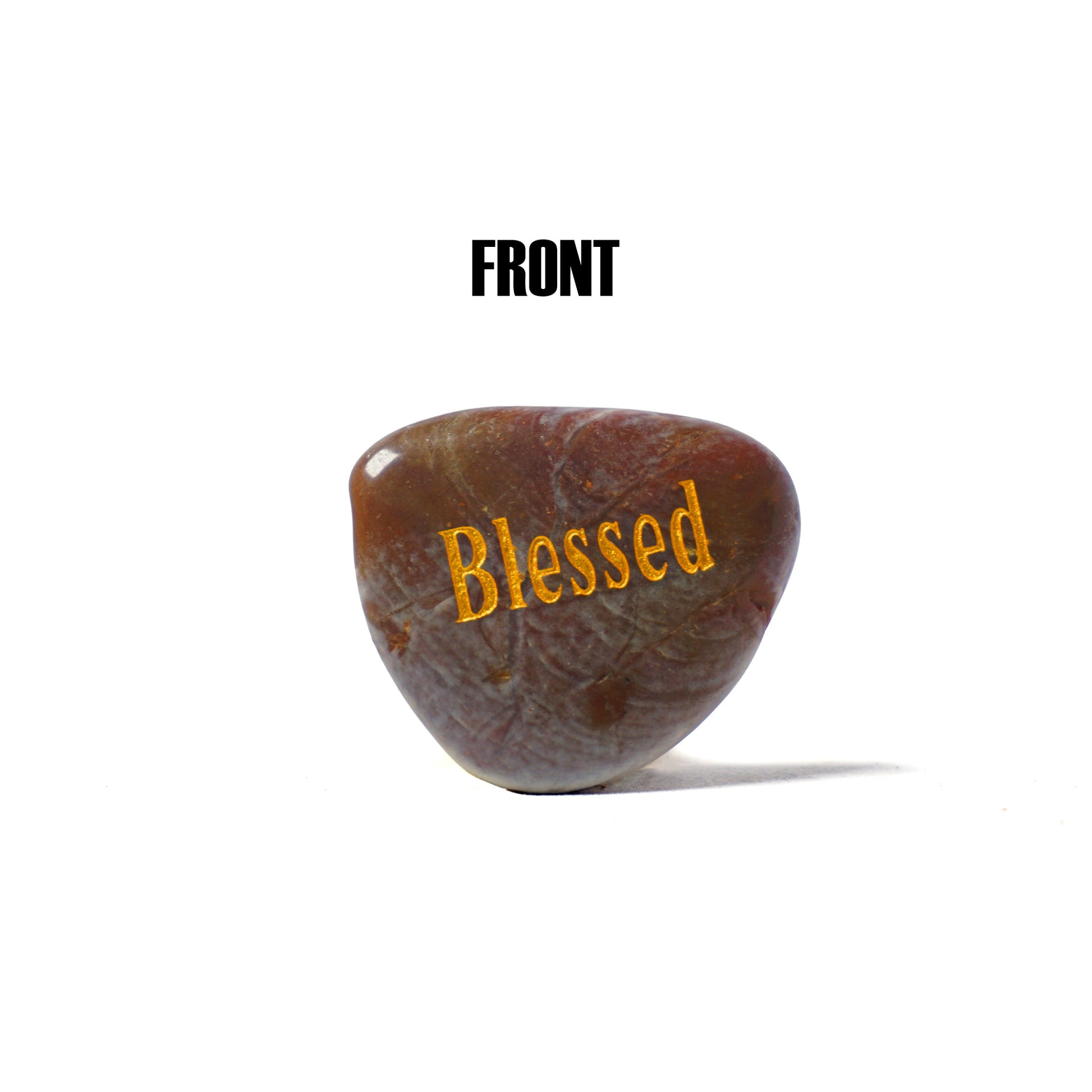 Brown stone with 'Blessed' engraved on a white background