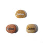 Three stones with 'Celebrate' engraved on them against a white background
