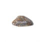 Heart-shaped stone with 'Determination' engraved on a white background