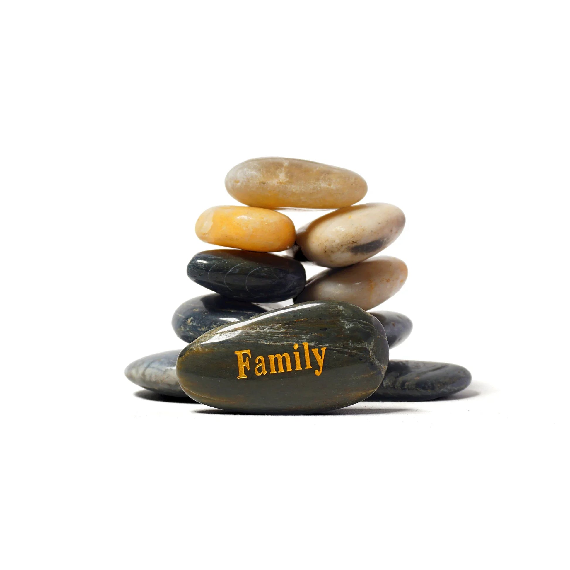 Stack of stones with a engraved 'Family' on a white background