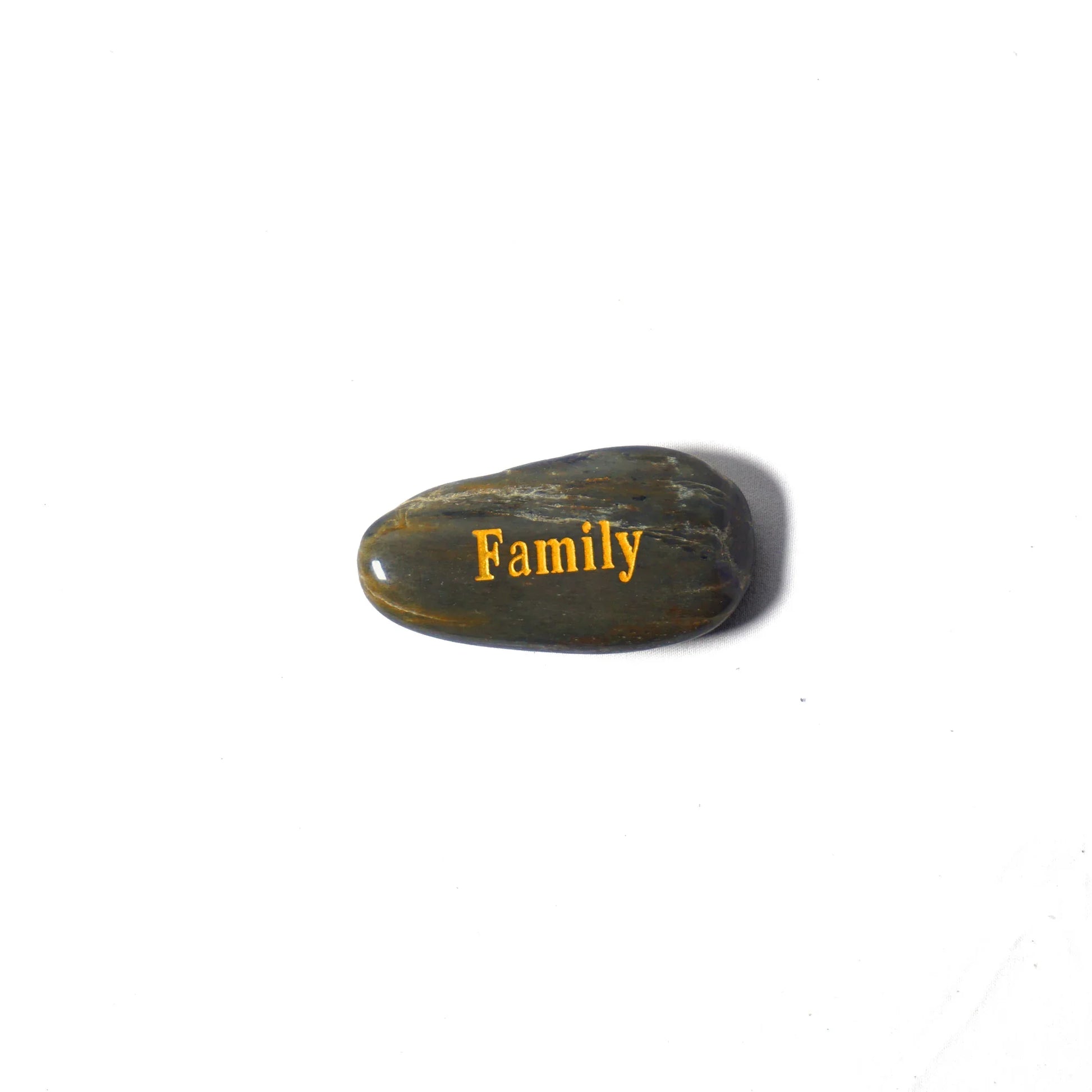 Rock with 'Family' engraved on a white background