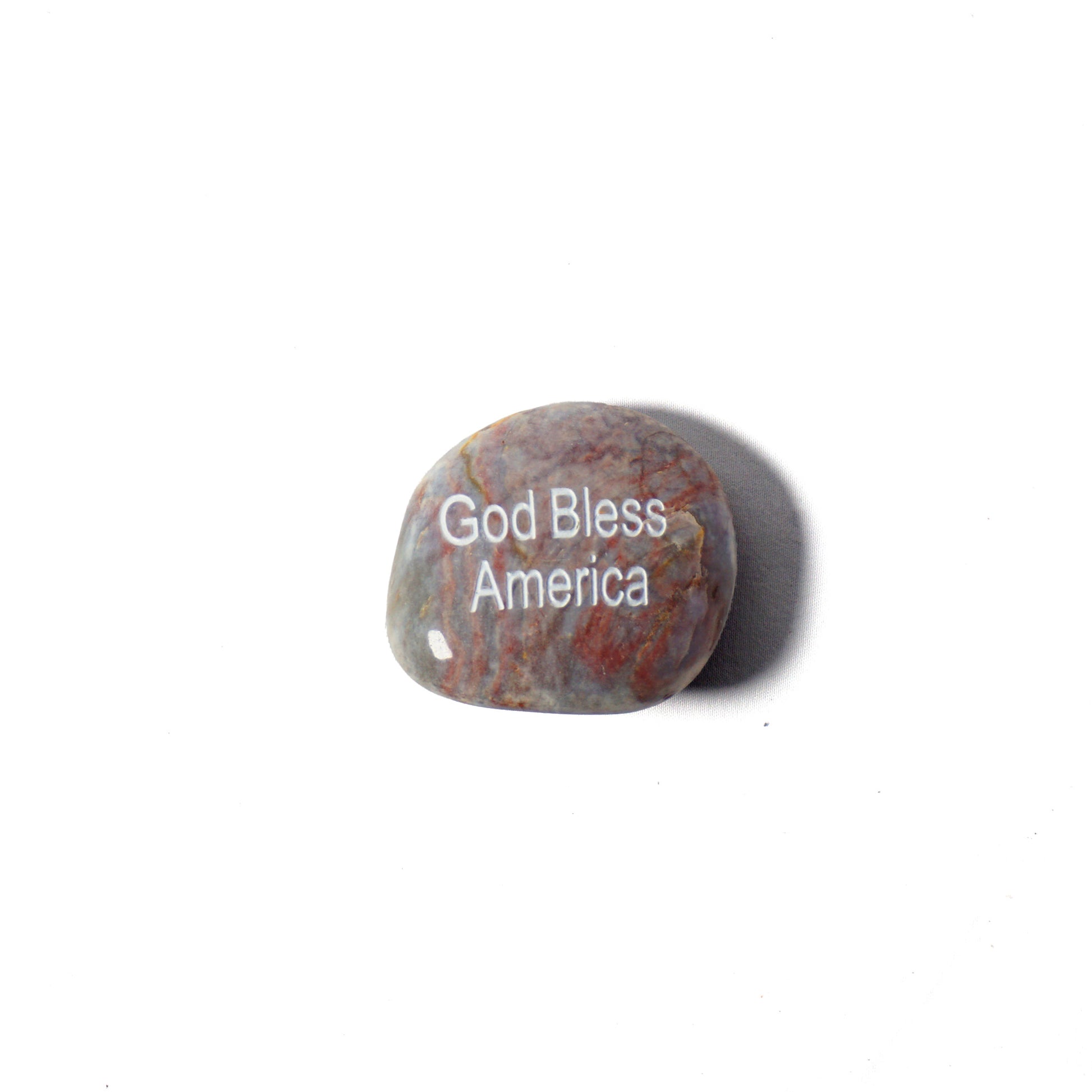 Decorative stone with 'God Bless America' text on a white background
