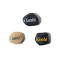 Three stones with 'Grateful' engraved on them on a white background