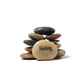 Stack of stones with a prominent stone labeled 'Healing' on a white background