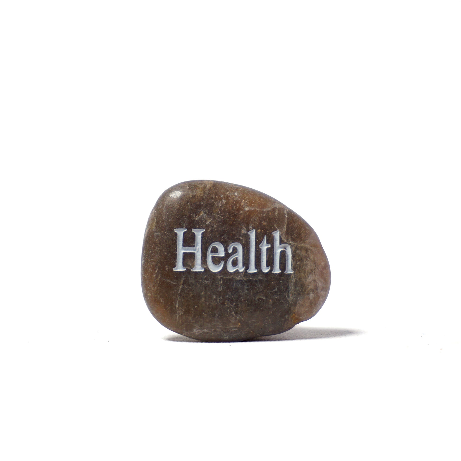 Brown stone with 'Health' engraved on a white background