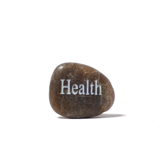 Brown stone with 'Health' engraved on a white background