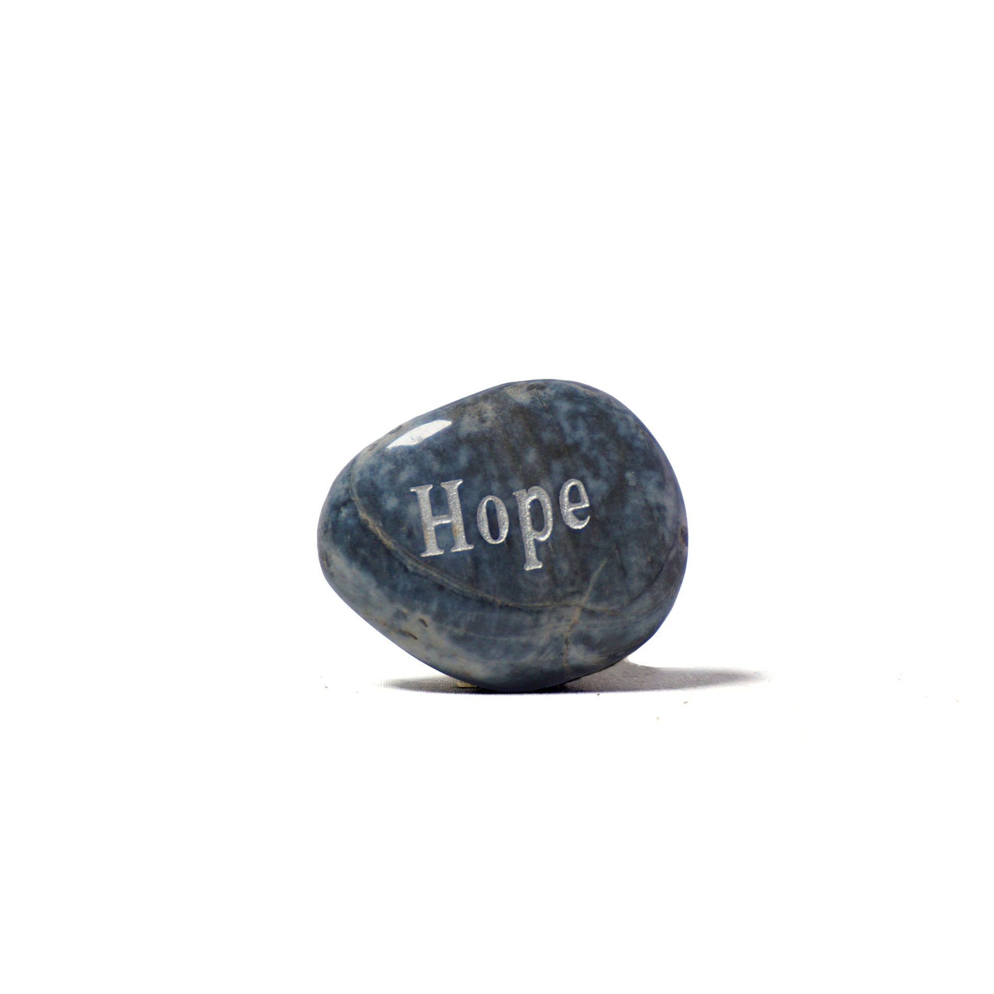 Blue stone with 'Hope' engraved on a white background