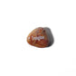 Brown stone with 'Imagine' engraved on a white background