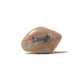 Decorative stone with 'Laugh' engraved on a white background