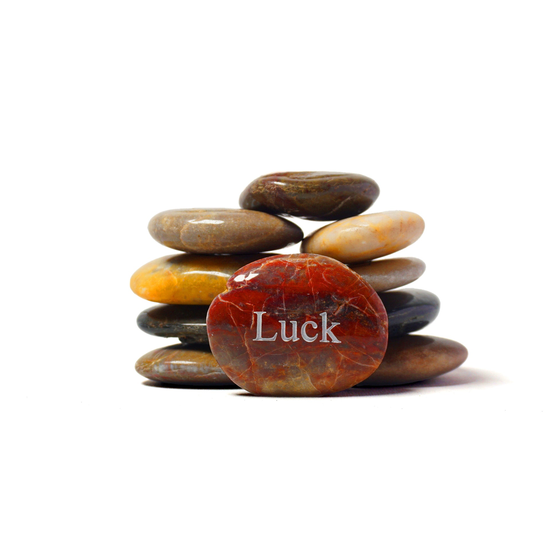 Stack of stones with a red stone labeled 'Luck' on a white background