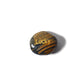 Tiger's eye stone with 'Lucky' engraved on a white background