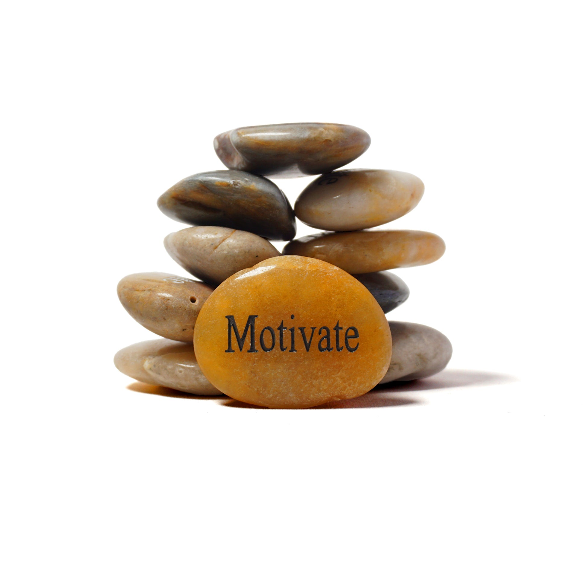 Stack of stones with a yellow stone in the center displaying the word 'Motivate' on a white background
