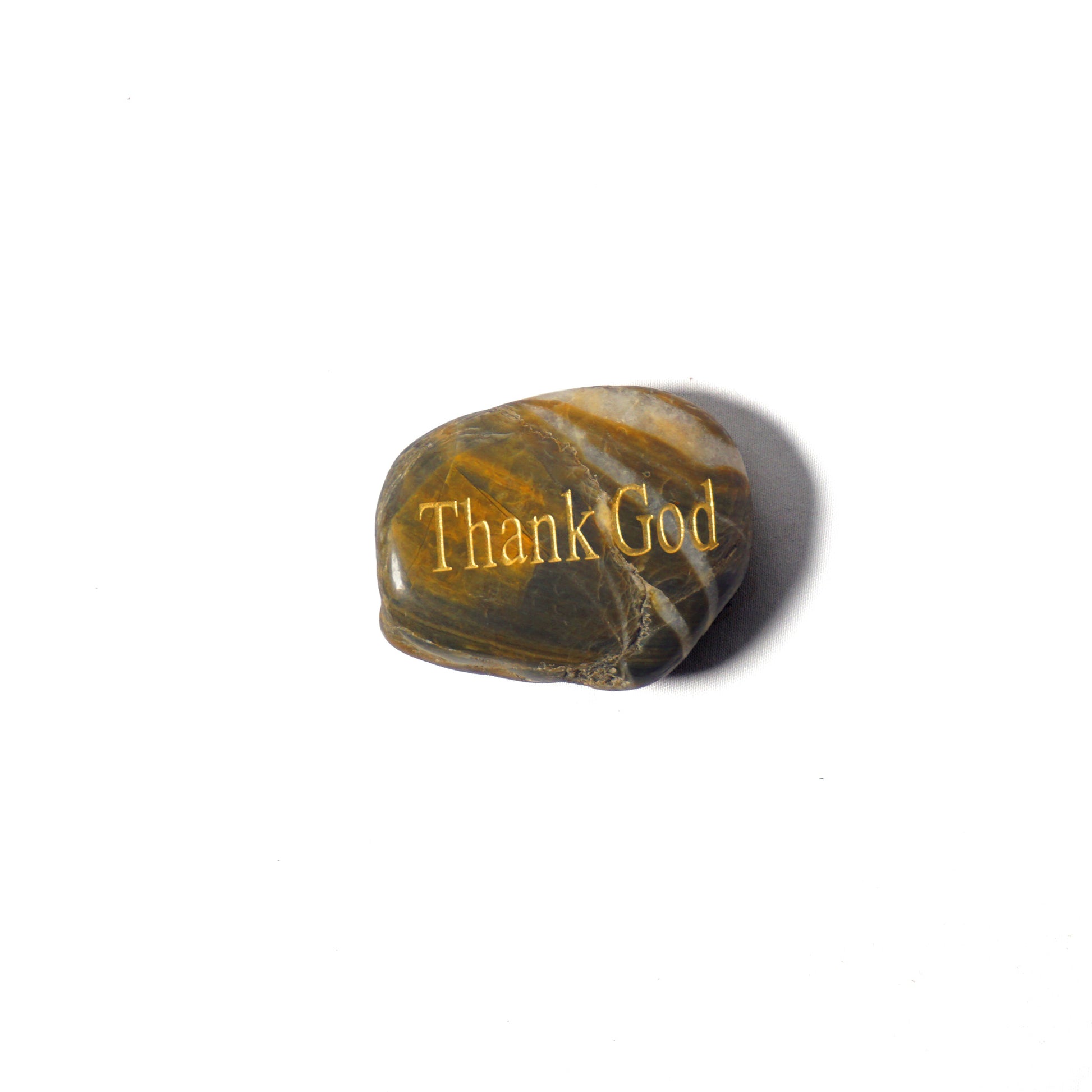Marble-textured stone with 'Thank God' engraving on a white background