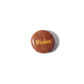 Brown stone with 'Wisdom' engraved on a white background